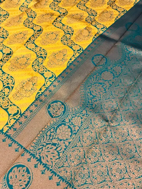 Gorgeous Yellow Color Art Silk Saree With Butta Motifs And Rich Pallu