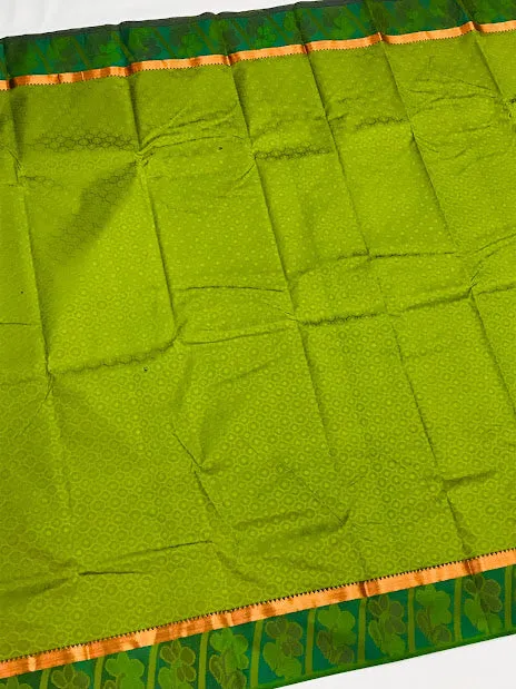 Traditional Olive Green Color Art Silk Saree With Flower Motifs And Copper Zari Border